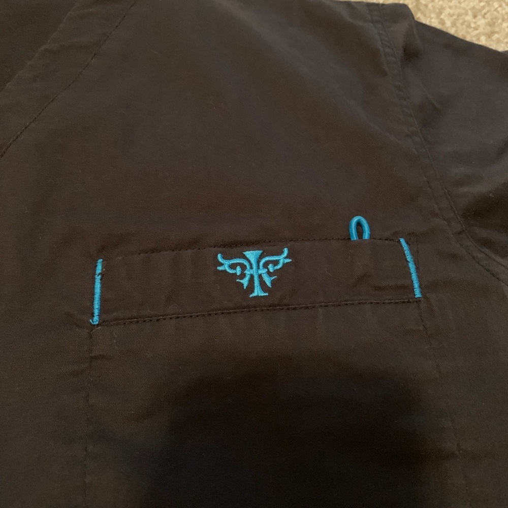 Five sets of Med couture scrubs